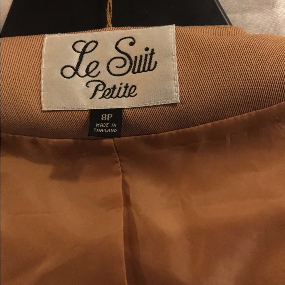 A woman 2 Peace Le Suit size 8p